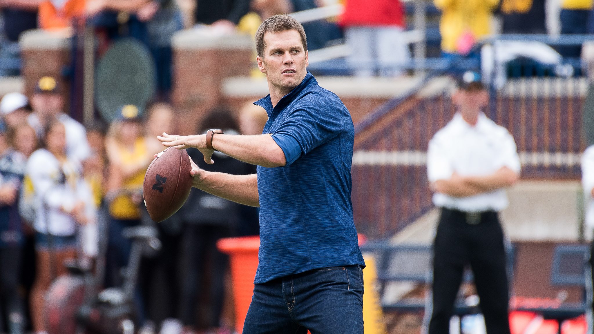 Tom Brady plays catch with Head Coach Jim Harbaugh before Michigan's 45-28 victory over Colorado on September 17, 2016. (James Coller/Maize and Blue Nation)